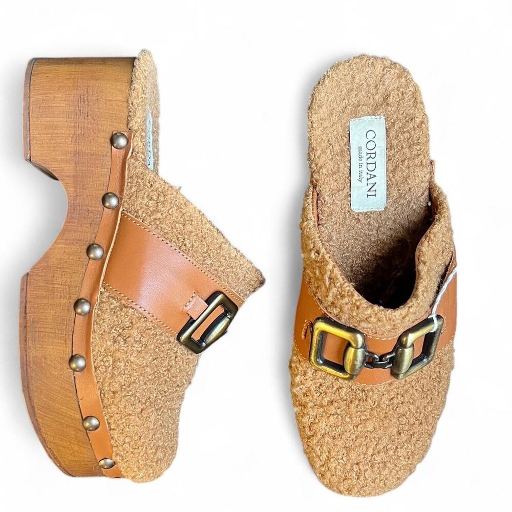Authentic Cordani faux shearling platform mules